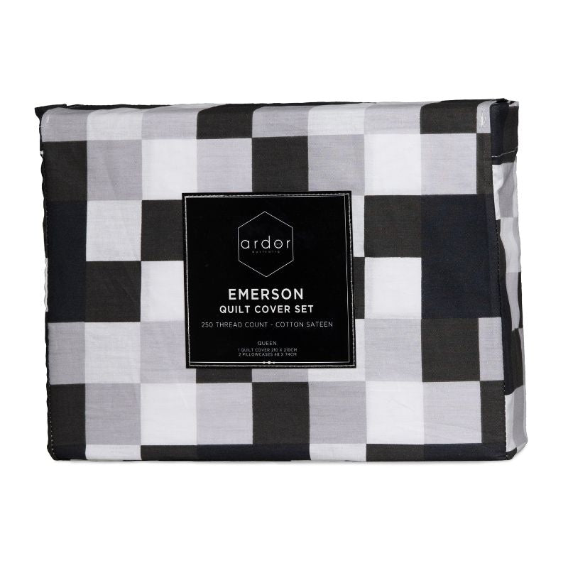 Packaging details of a black and white quilt cover set with checkered pattern and subtle geometric reverse, perfect for a unique style.