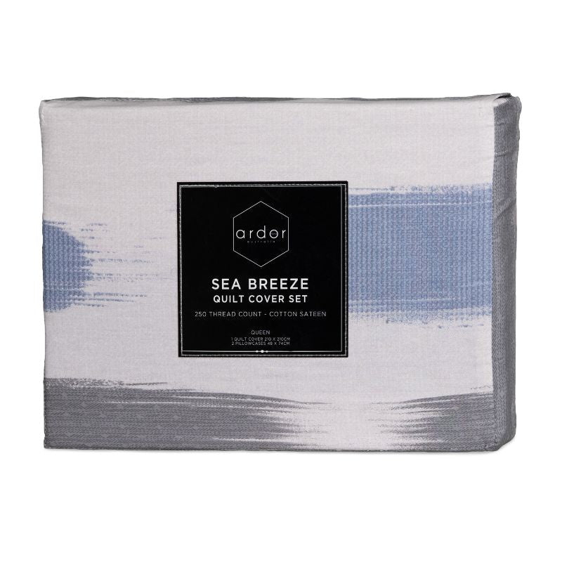 Packaging details of a Sea Breeze quilt cover set that brings the rugged beauty of the coastline to your space with its soft blue and grey colour palette and layered textures.