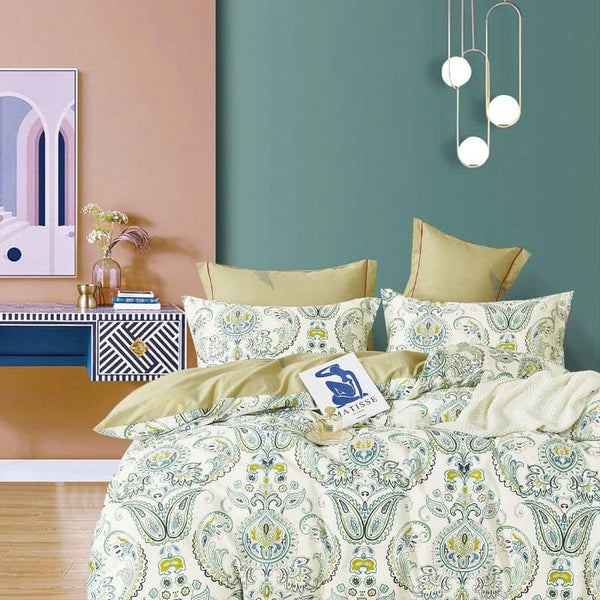 Moroccan geometric design in blue and green hues, escape to Morocco with this tranquil and warm summer-inspired quilt cover.
