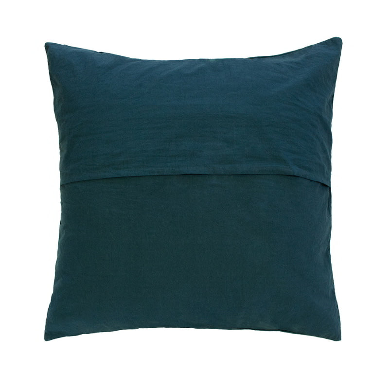 Back details of an opulent deep teal velvet pillow, ideal for enhancing the sophistication and cosiness of your bedroom design.