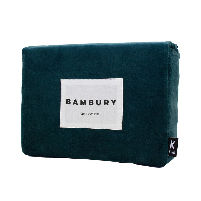 Front details of a nice packaging of sumptuous quilt cover set in deep teal velvet, offering elegance and comfort with plush texture, includes pillowcases, machine washable.