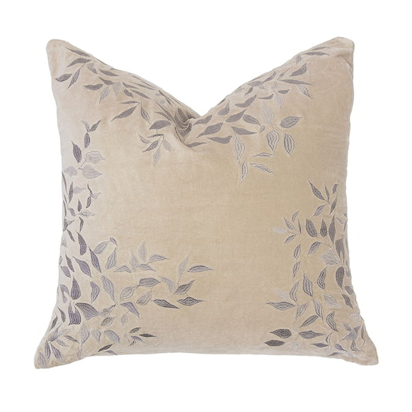 Front details of a natural tone cushion made from luxurious cotton velvet with delicate leaf embroidery, brings nature-inspired elegance to your home.