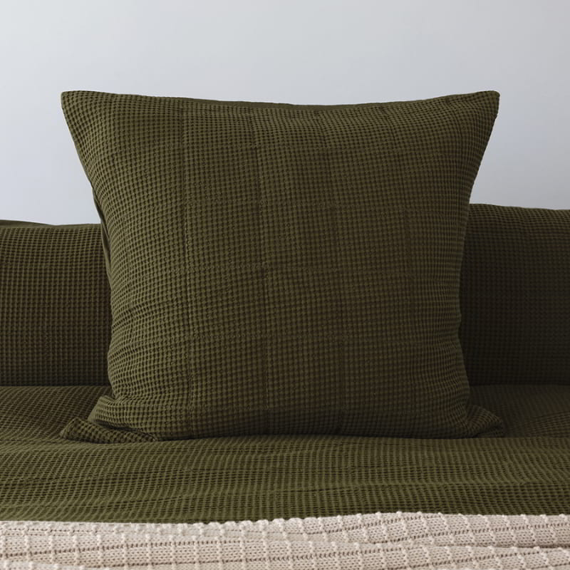 Soft cotton waffle european pillowcase in olive green with quilted square pattern, perfect blend of style and comfort.