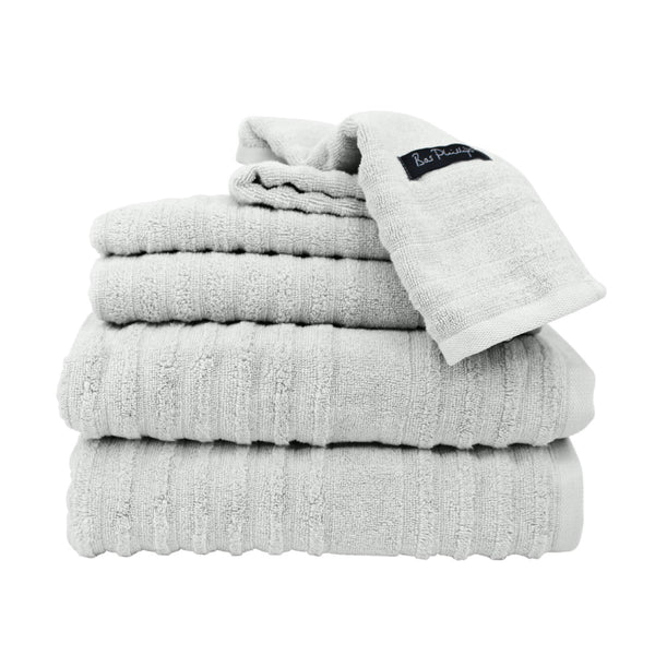 alt="A pile of folded elouera 6 pack towel in silver colour featuring its premium-quality zero twist cotton and ribbed design"
