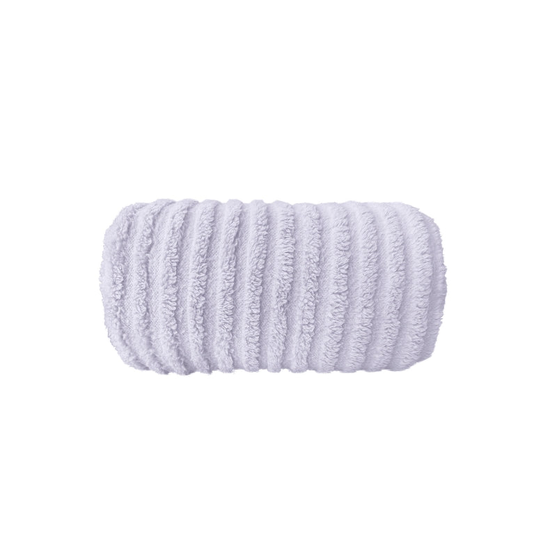 The purple Bas Phillips Haven Sherpa Ribbed Blanket, a warm and cosy addition to your queen-sized bed.