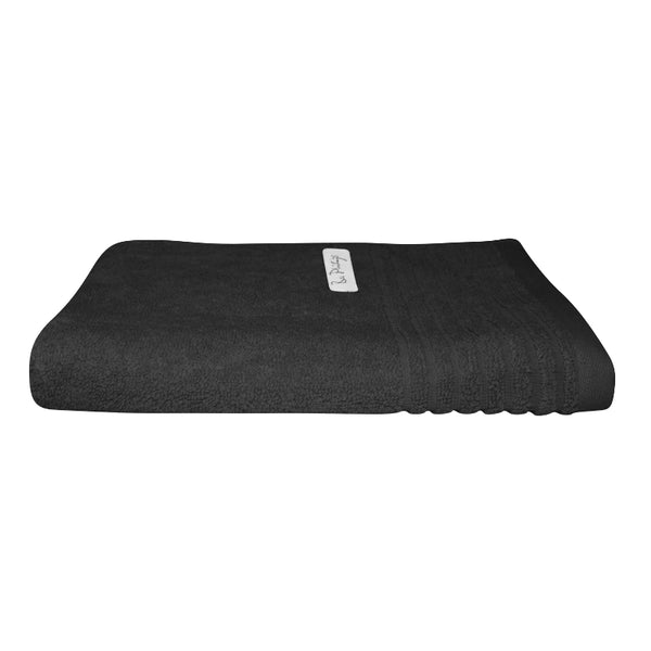 alt="An elegantly folded premium black hand towel, showcasing its minimal and soft details"