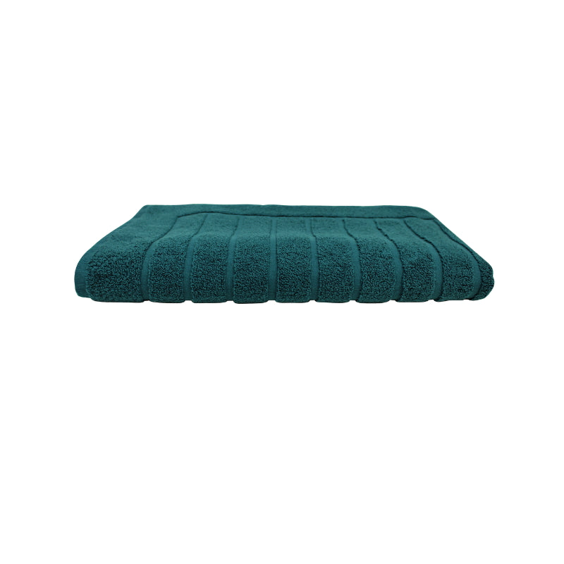 alt="The Teal Valencia Zero Twist bath mat unveils intricate folded details, adding a luxurious touch to your bathroom"
