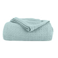 alt="A blue cotton blanket featuring its luxuriously soft and resilient Cotton with added polyester."