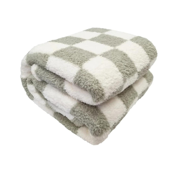Stay warm and stylish with this Printed Sherpa blanket, designed with a trendy check pattern for the perfect blend of fashion and comfort.