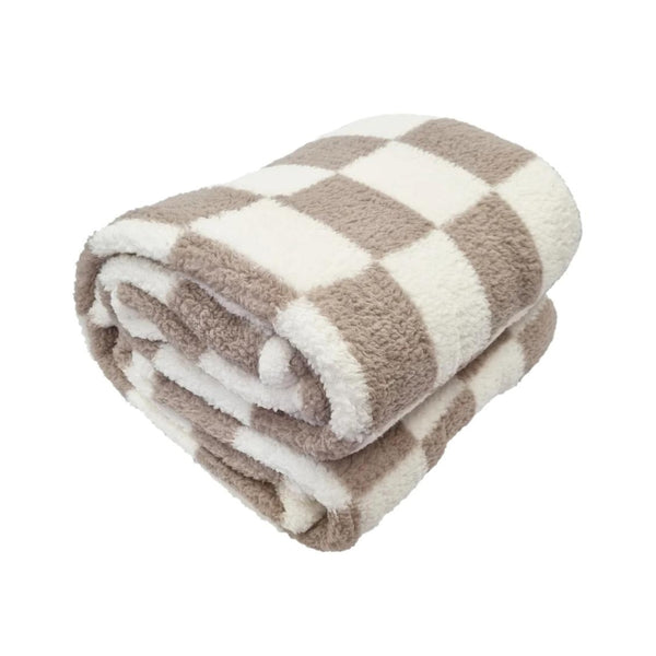 Elevate your comfort with the fashionable Printed Sherpa blanket, featuring a chic check design for cosy nights.