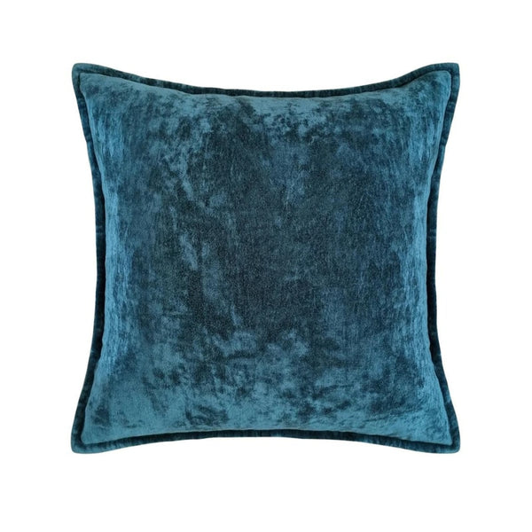 Blue velvet cushion made from soft fabric, adds sophistication to any room, perfect for chilly evenings or a cosy reading nook.