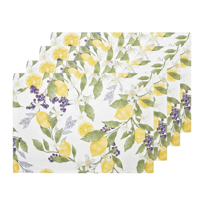 alt="4 pieces of printed placemats stacked  featuring lemons and flowers"