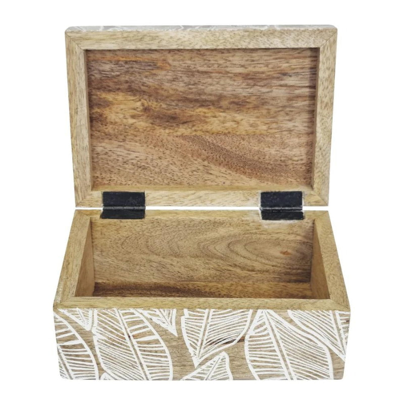 alt="Inside details of natural trinket box featuring hand-carved with a delicate leaf design"