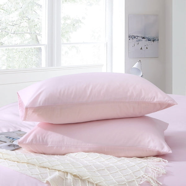 alt="Hypoallergenic and naturally anti bacterial pink queen pillowcase crafted from a soft 100% polyester"