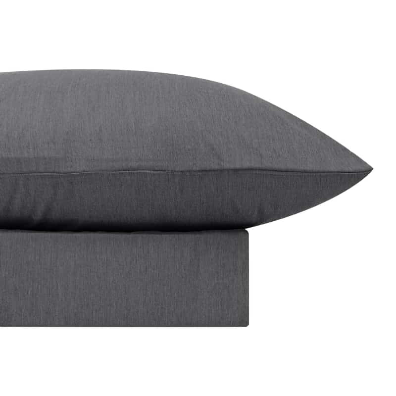 alt="Close-up look of a luxuriously soft to touch bamboo and microfibre blend sheet set in charcoal"