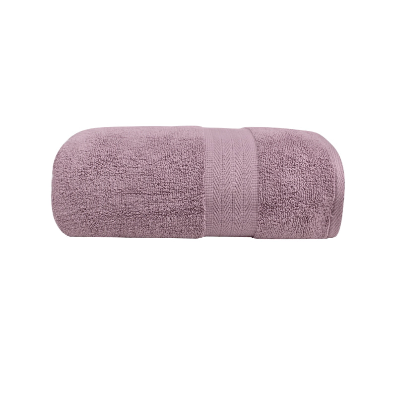 alt="Zoom in details of mauve mist bath towel featuring its high level of softness and premium luxurious cotton."
