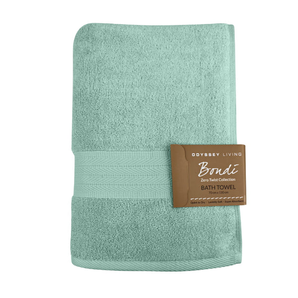 alt="A folded with tag details of dusty sea bath towel featuring its high level of softness and premium luxurious cotton."