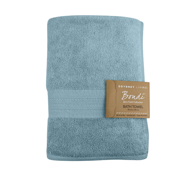 alt="A folded with tag details of spa blue bath towel featuring its high level of softness and premium luxurious cotton."