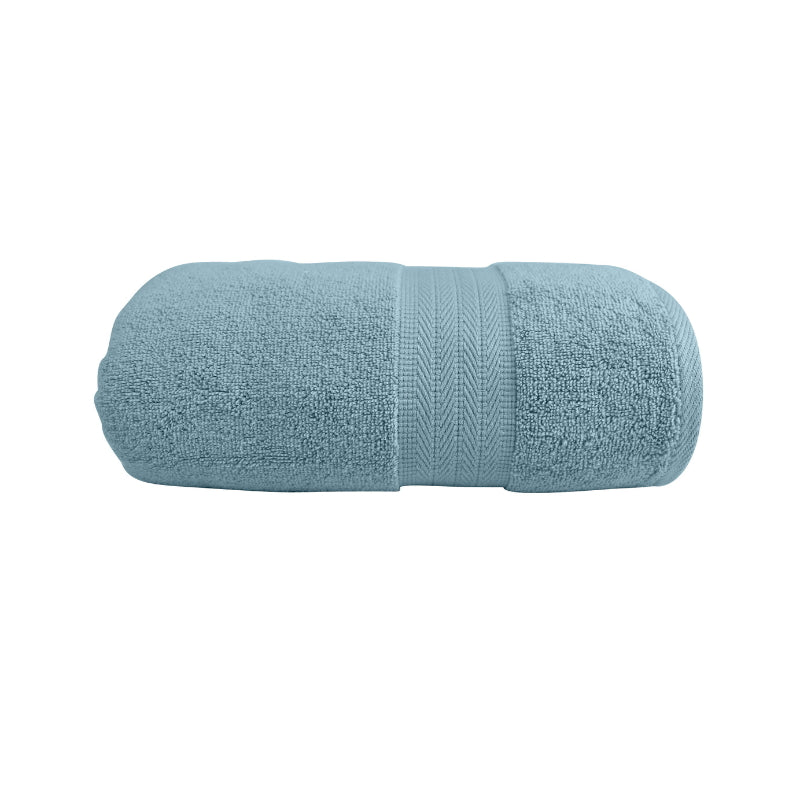 alt="Zoom in details of spa blue bath towel featuring its high level of softness and premium luxurious cotton."