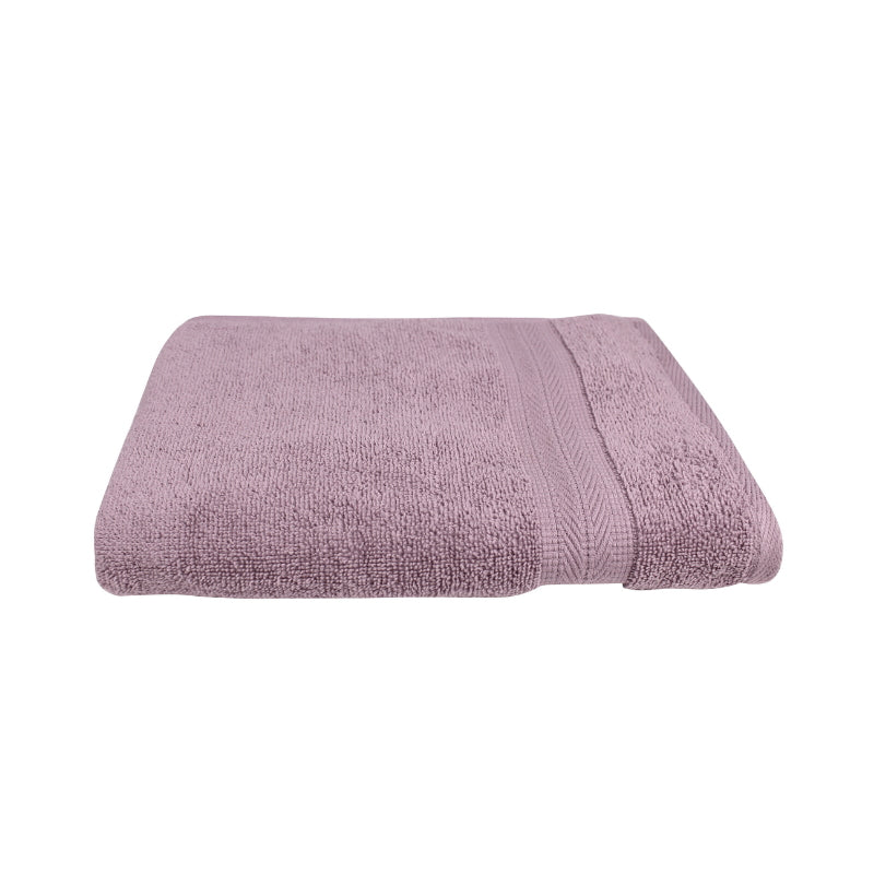 alt="An elegantly folded premium mauve mist oasis hand towel, showcasing its minimal and soft details"