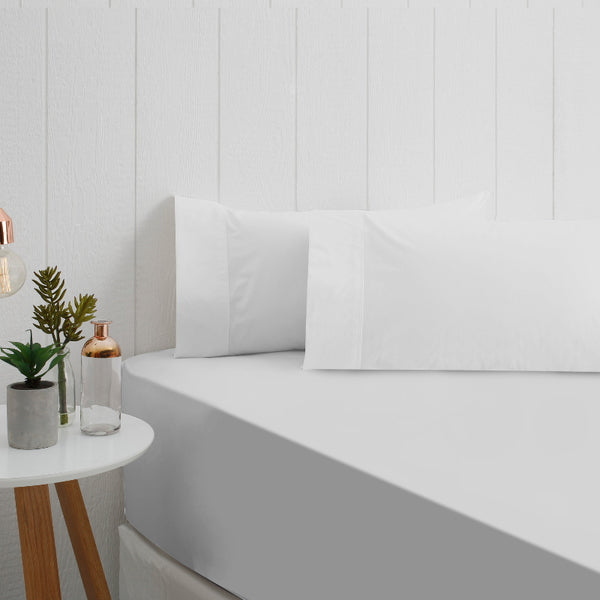 alt="A stunning White breath cotton sheet set in a bedroom setup"