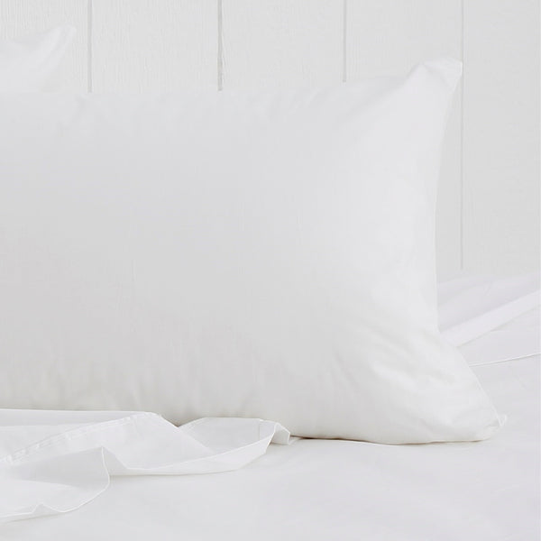 alt="The actual photo of a white breath cotton standard pillowcase featuring its minimal, inviting softness and comfort" 
