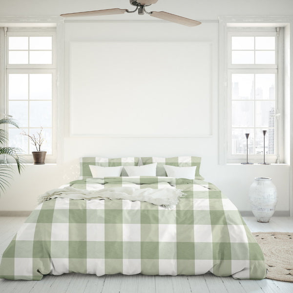The Chelsea Sunwashed Comforter Set offers a calm, sophisticated touch to your bedroom with its modern design and soft sage and white chequered pattern by Odyssey Living.