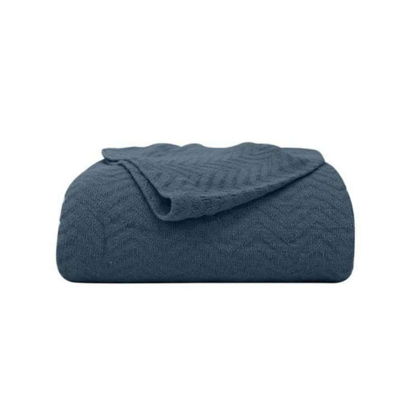 alt="Zoom in details of denim Cotton Blanket featuring its unique textured, softness and high quality cotton."
