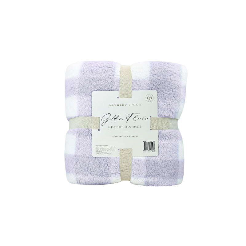 Back packaging details of a cosy bed with a lilac and white blanket featuring a large checkered pattern creates a bold visual grid, adding colour and pattern to the room's decor.