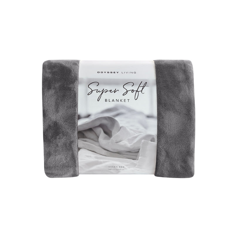 Front packaging details of the charcoal Odyssey Living Super Soft Blanket creating the perfect setting to cosy up in the luxurious comfort and warmth of the bed.
