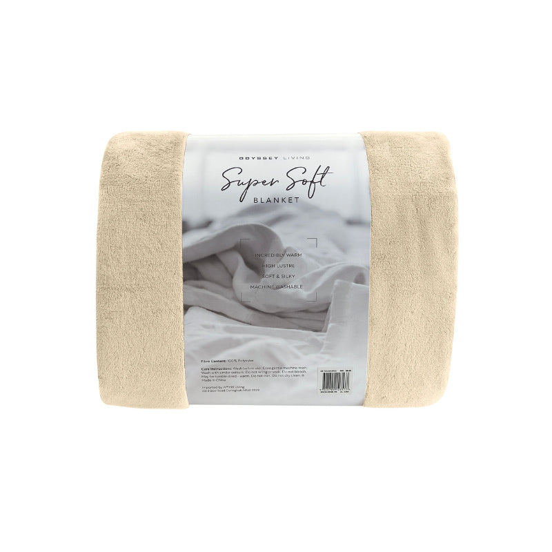 Back packaging details of the cream Odyssey Living Super Soft Blanket creating the perfect setting to cosy up in the luxurious comfort and warmth of the bed.
