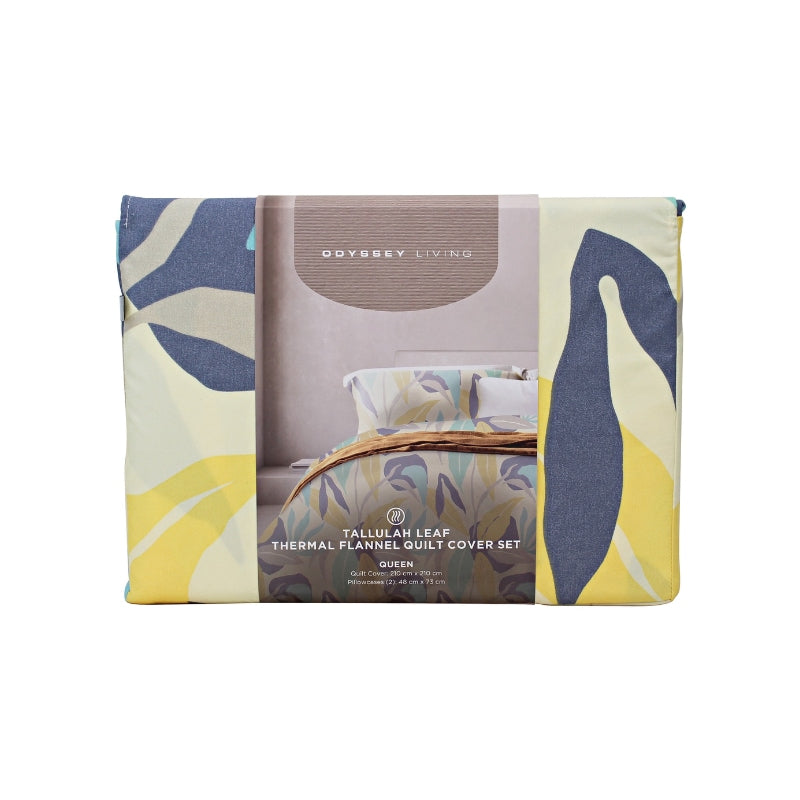 Front packaging details of a modern bedroom with a blue and yellow quilt cover set, featuring a botanical leaf pattern in soft tones, perfect for warmth and comfort.