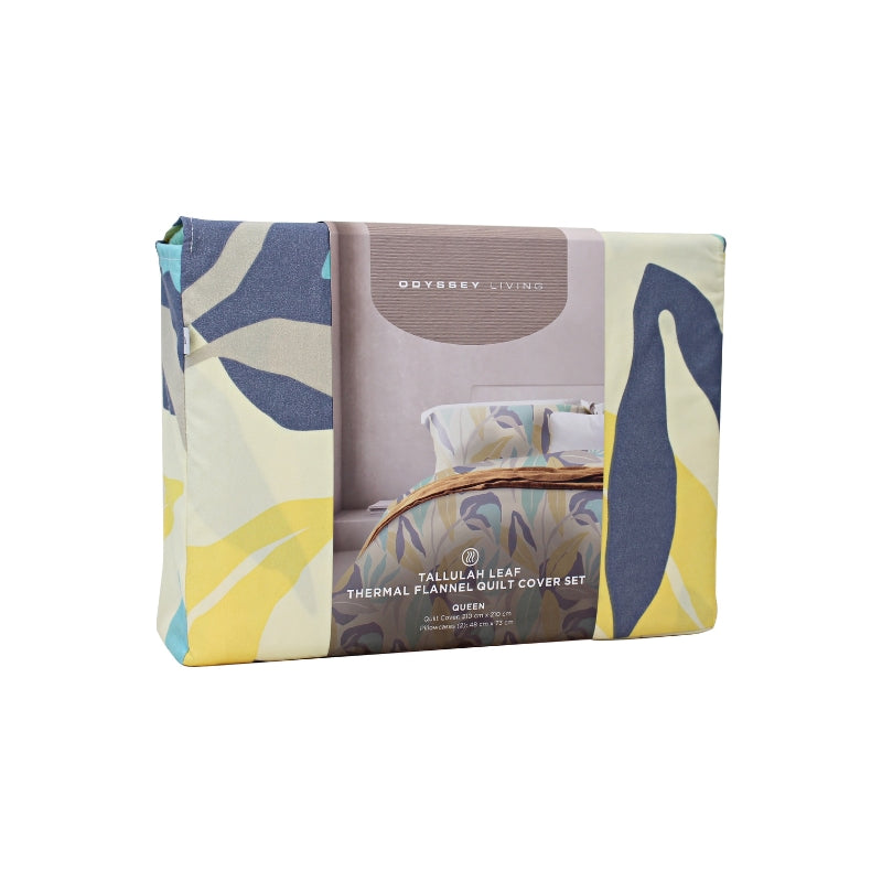 Side packaging details of a modern bedroom with a blue and yellow bedspread, featuring a botanical leaf pattern in soft tones, perfect for warmth and comfort.