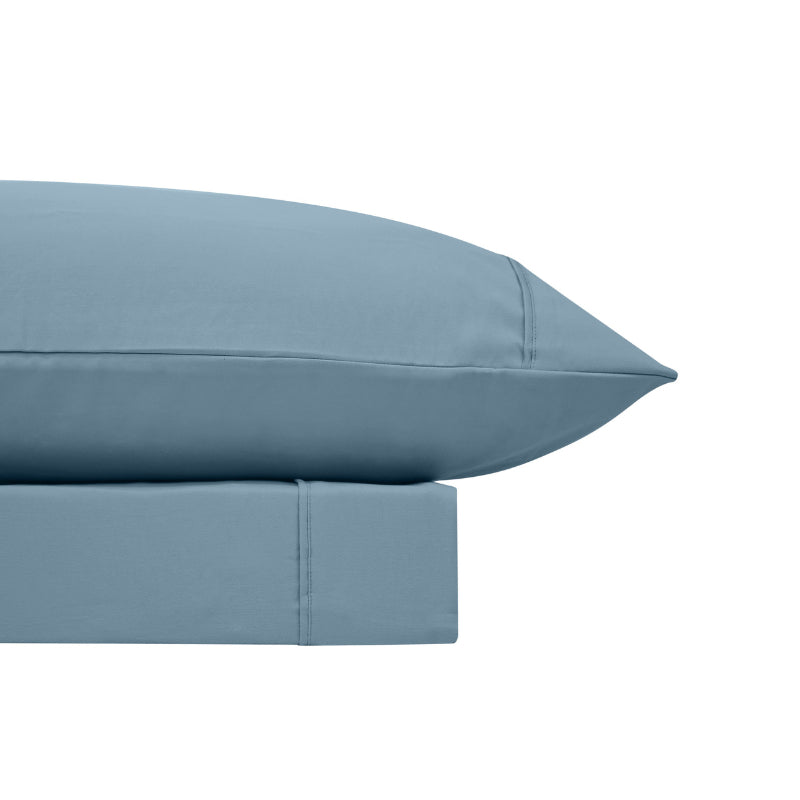A clean and classic blue bed sheets and pillows, made of 100% microfibre for a soft and warm feel.