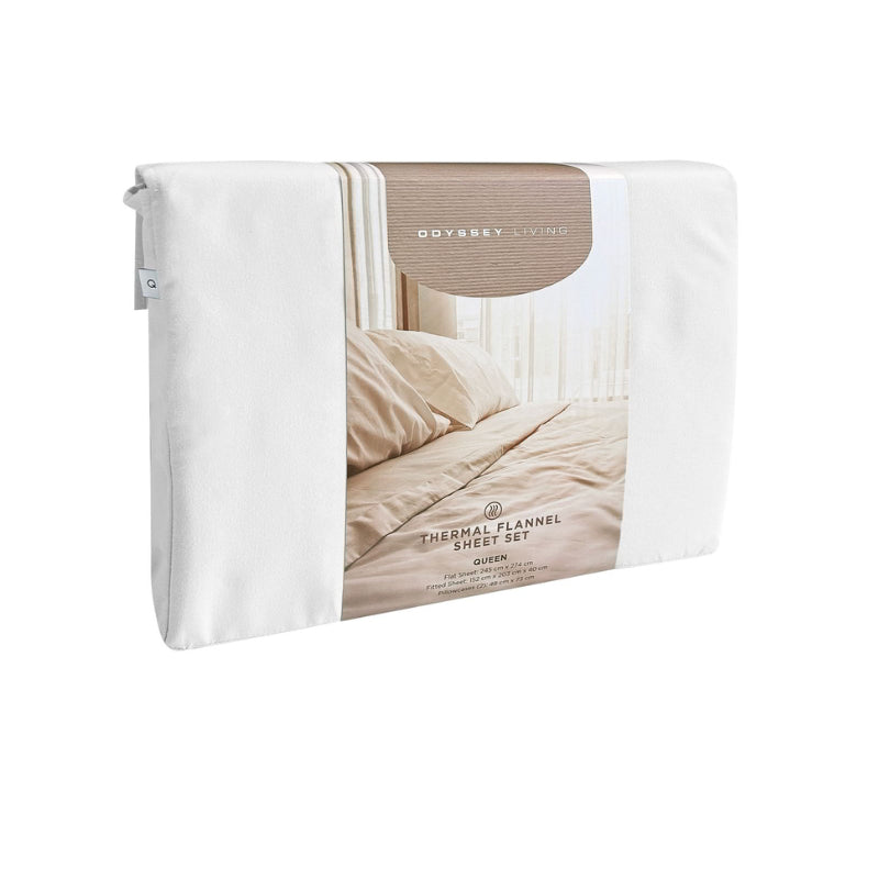 Side packaging details  of a clean and classic white bed with matching sheets and pillows, made of 100% microfibre for a soft and warm feel.