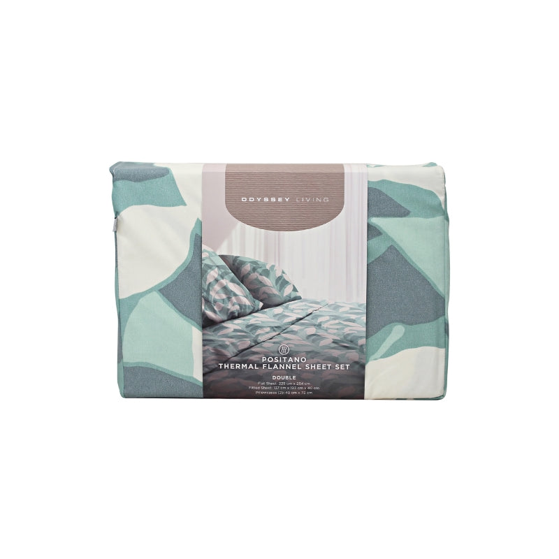 Front packaging details of a cosy bed with a teal and white sheet set from Odyssey Living, featuring a modern abstract pattern in teal and white tones.
