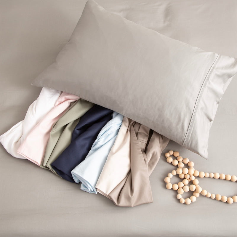 alt="A colourful pillow experiences the soft and gentle bamboo cotton blend combo set, woven with 500 thread count. Naturally breathable, protects skin, anti-wrinkle satin finish."