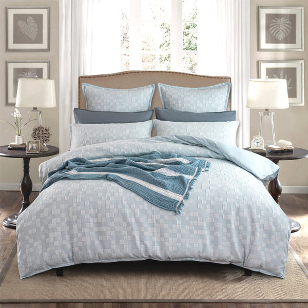 alt="French blue quilt cover set designed with delicate quilting texture and is pleasant to the touch, instantly bringing life to any bedroom."