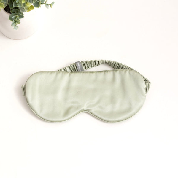 alt="Sage silk eye mask with 6 layers of soft padding, made from 100% pure mulberry silk. Gentle on skin, prevents wrinkles, and hydrates."