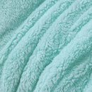 Close-up of a textured teal fabric