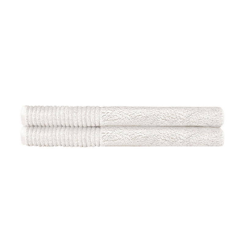 alt="Two beautiful, soft ivory cotton bath mats"