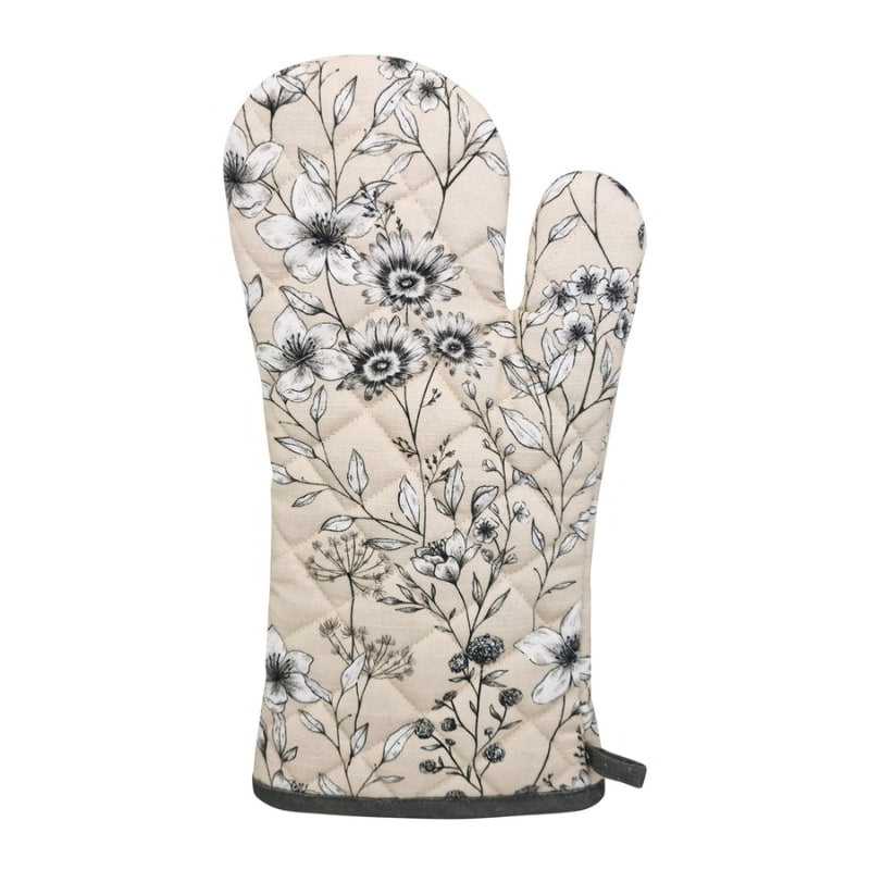 alt="Front details of a cream oven mitt featuring blooming and blossoming of wild field flowers"