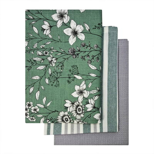alt="Set of green tea towels feature one printed design, one striped design and one plain waffle."
