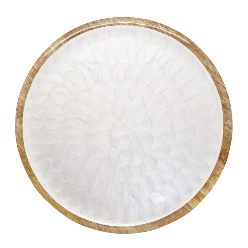 alt="Front details of a natural serving plate featuring a stunning embossed pearl design coated in enamel with a carved mango wood base"