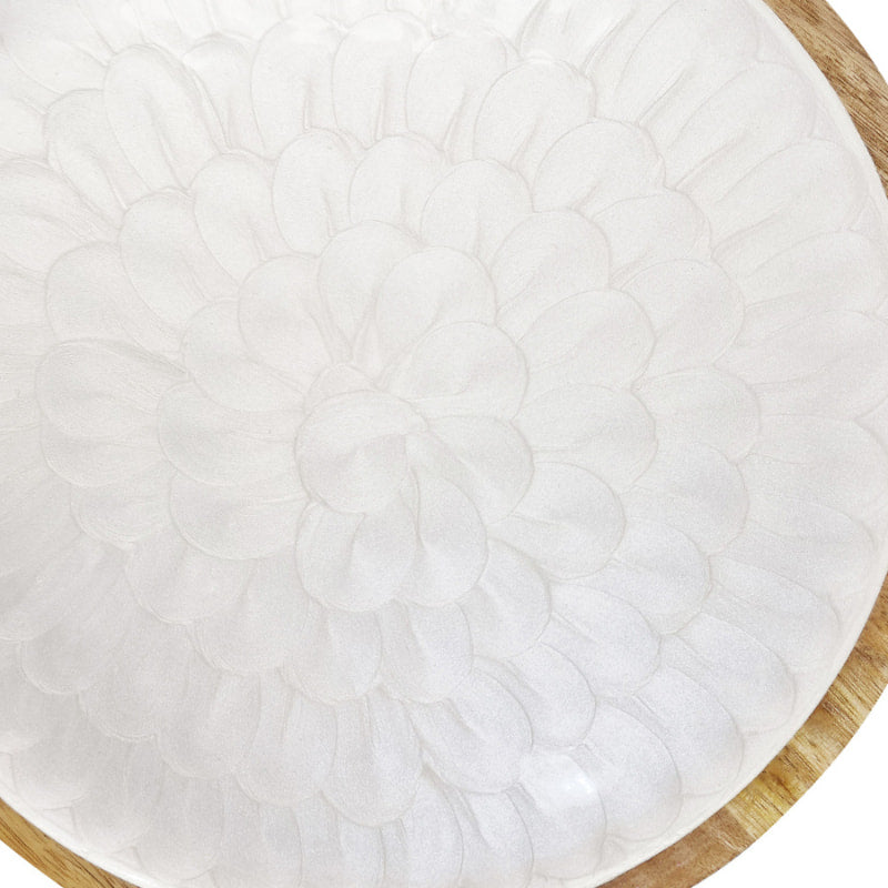 alt="Zoom in details of a natural serving plate featuring a stunning embossed pearl design coated in enamel with a carved mango wood base."