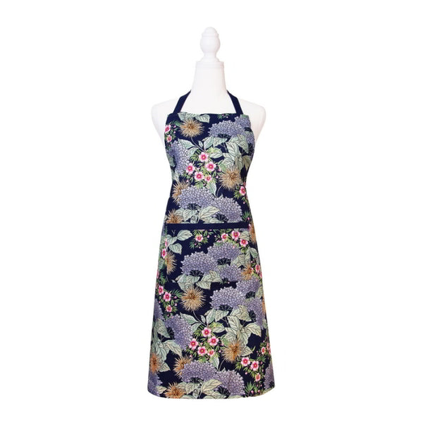 alt="A navy apron features beautiful flowers and colours of an Australian summer garden"