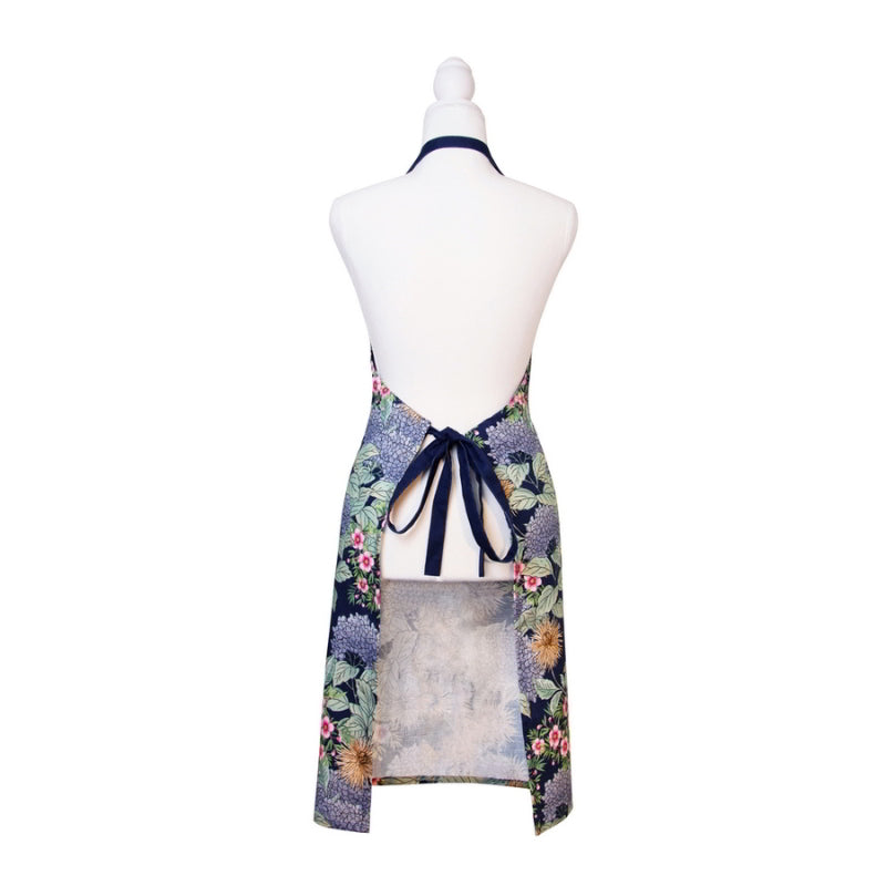 alt="Back details of a navy apron featuring beautiful flowers and colours of an Australian summer garden"