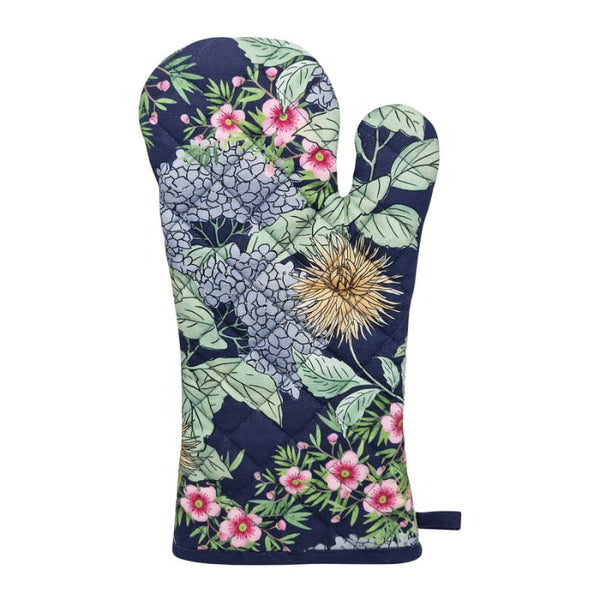 alt="A navy oven mitt features beautiful flowers and colours of a summer garden"