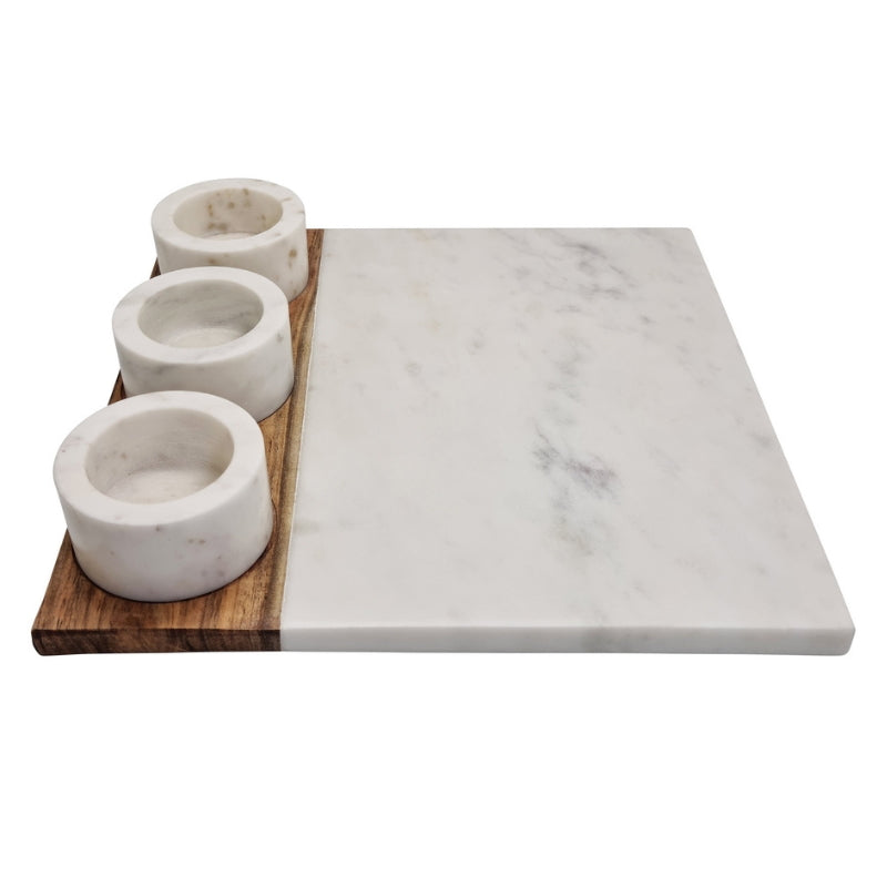 alt="Side details of serving board with dip bowls rafted from a combination of gorgeous white marble with an acacia wood accent."