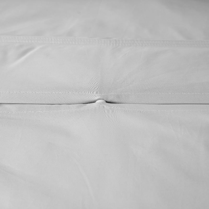 Close up details of the Accesorize Double Stitch Grey Quilt Cover Set, a luxurious blend of bamboo and cotton for year-round comfort.